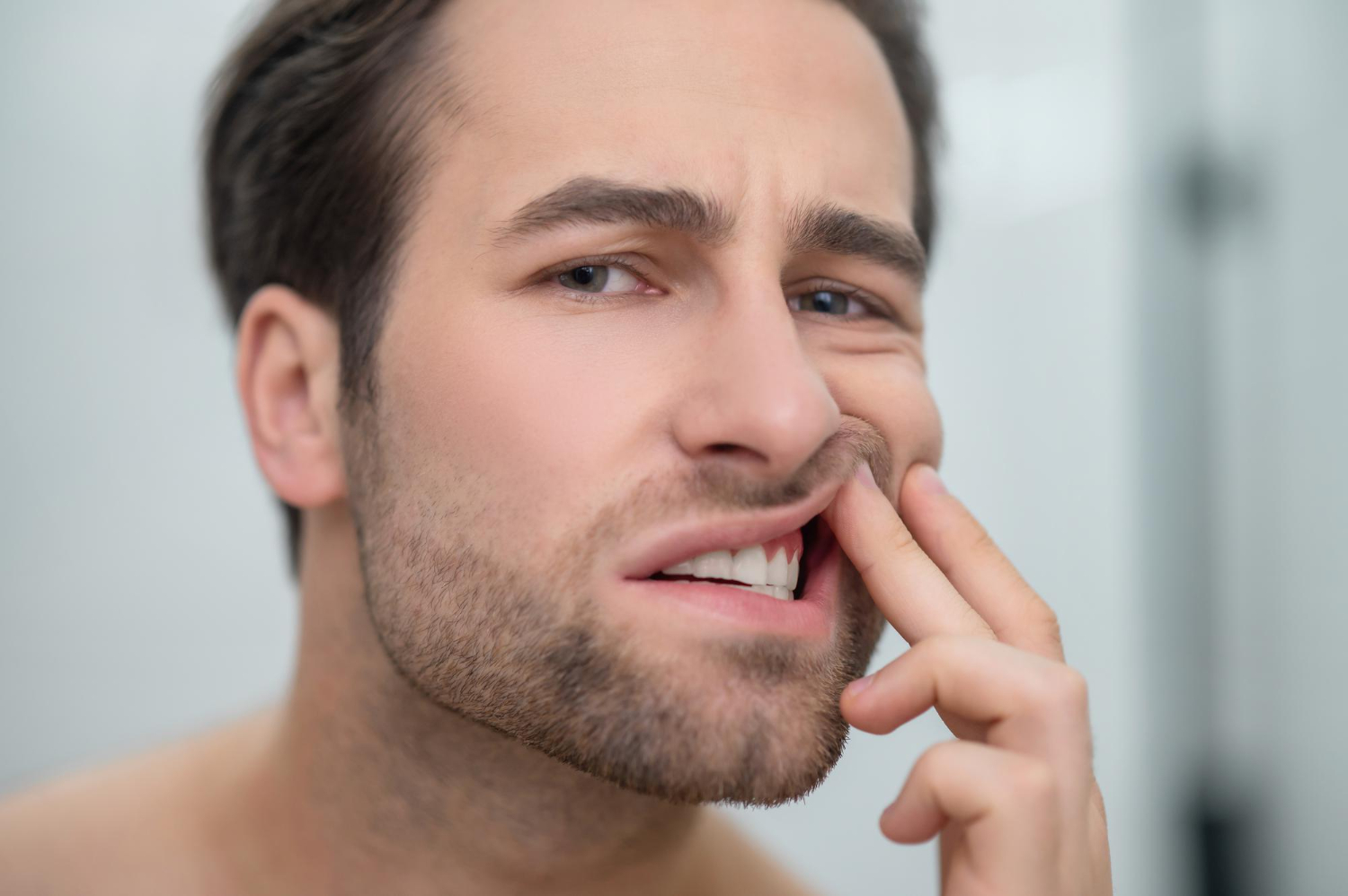 Early signs of gum disease including bleeding and swollen gums